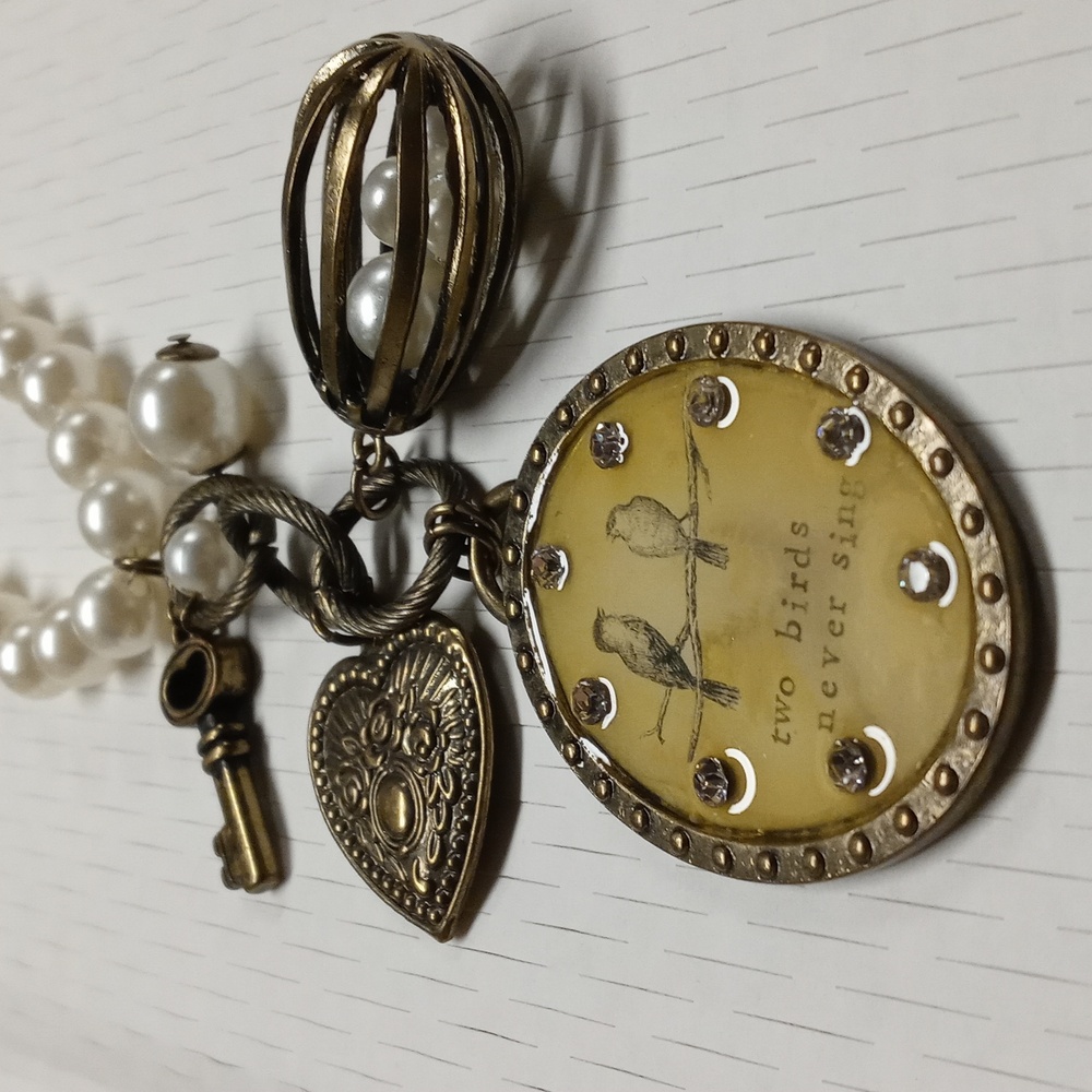 Faux Pearl and Bronze Necklace with Charms Heart Key Birds and Pearl Cage